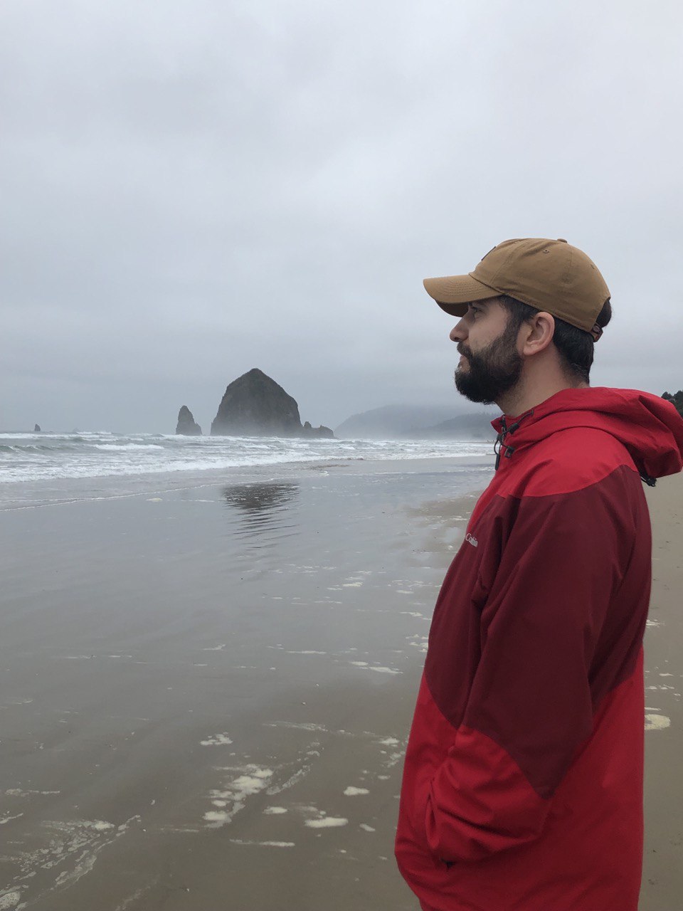 Tyler Gage, owner of Urban Yards, standing on the Oregon Coast.